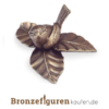 Vogel aus Bronze auf Blatt